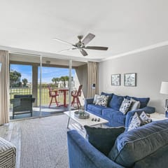 2BR First-Floor Condo with Private Patio + Pools & Bikes | Magnolia House 102