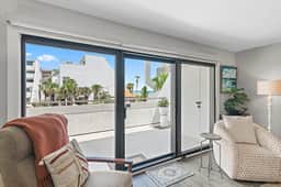 2BR Gulf View Condo with 40ft Balcony + Renovated Interiors | Aegean 206 - Image 2