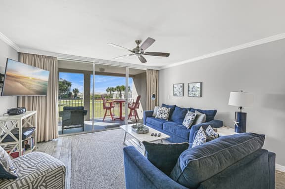 2BR First-Floor Condo with Private Patio + Pools & Bikes | Magnolia House 102 - Image 1