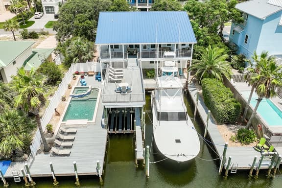 4BR Waterfront Home with Private Pool + Lake Views | Safe Harbor - Image 1